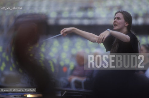 Sferisterio in Macerata, 1991. Italian conductor Elisabetta Maschio performing a rehearsal / Sferisterio di Macerata 1991. Il direttore dorchestra Elisabetta Maschio dirige una prova - ©Marcello Mencarini/Rosebud2