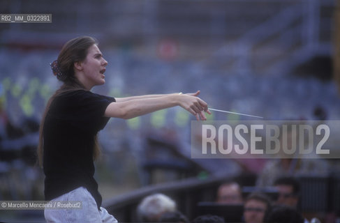 Sferisterio in Macerata, 1991. Italian conductor Elisabetta Maschio performing a rehearsal / Sferisterio di Macerata 1991. Il direttore dorchestra Elisabetta Maschio dirige una prova - ©Marcello Mencarini/Rosebud2