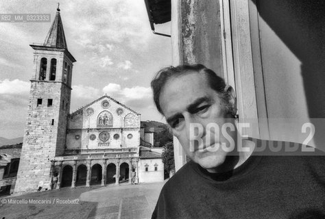 Spoleto (Perugia), Festival of Two Worlds 1980. Composer and founder of the Festival of Two Worlds Gian Carlo Menotti at a window of his home with a view on the Cathedral square / Spoleto (Perugia), Festival dei due mondi 1980. Il compositore Gian Carlo Menotti, fondatore del festival, a una finestra della sua casa con vista su piazza del Duomo - ©Marcello Mencarini/Rosebud2