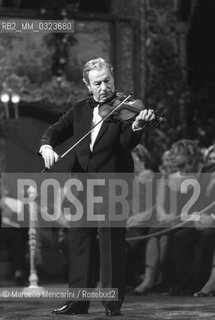 Venice 1986. Violinist Nathan Milstein performing at La Fenice Theater / Venezia, 1986. Il violinista Nathan Milstein in concerto al Teatro La Fenice - ©Marcello Mencarini/Rosebud2