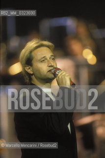 Sanremo Music festival 1991. Italian pop singer Amedeo Minghi performing his song Nené / Festival di Sanremo 1991. Amedeo Minghi canta Nené - ©Marcello Mencarini/Rosebud2