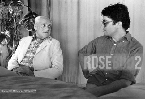 Castel Porziano (Rome) 1979, First Festival of the Poets. Italian writers Alberto Moravia and Dario Bellezza / Castel Porziano (Roma) 1979, Primo Festival dei Poeti. Gli scrittori Alberto Moravia e Dario Bellezza - ©Marcello Mencarini/Rosebud2