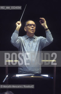 Rome, Pius XII Auditorium, 7-11-1998. Italian composer Ennio Morricone conducting a rehearsal / Roma, Auditorium Pio XII, 7-11-1998. Il compositore Ennio Morricone mentre dirige una prova - ©Marcello Mencarini/Rosebud2