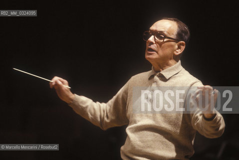 Rome, Pius XII Auditorium, 7-11-1998. Italian composer Ennio Morricone conducting a rehearsal / Roma, Auditorium Pio XII, 7-11-1998. Il compositore Ennio Morricone mentre dirige una prova - ©Marcello Mencarini/Rosebud2