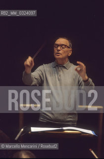 Rome, Pius XII Auditorium, 7-11-1998. Italian composer Ennio Morricone conducting a rehearsal / Roma, Auditorium Pio XII, 7-11-1998. Il compositore Ennio Morricone mentre dirige una prova - ©Marcello Mencarini/Rosebud2