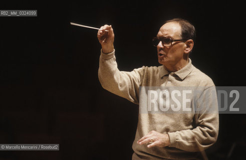 Rome, Pius XII Auditorium, 7-11-1998. Italian composer Ennio Morricone conducting a rehearsal / Roma, Auditorium Pio XII, 7-11-1998. Il compositore Ennio Morricone mentre dirige una prova - ©Marcello Mencarini/Rosebud2