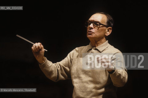 Rome, Pius XII Auditorium, 7-11-1998. Italian composer Ennio Morricone conducting a rehearsal / Roma, Auditorium Pio XII, 7-11-1998. Il compositore Ennio Morricone mentre dirige una prova - ©Marcello Mencarini/Rosebud2