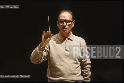 Rome, Pius XII Auditorium, 7-11-1998. Italian composer Ennio Morricone conducting a rehearsal / Roma, Auditorium Pio XII, 7-11-1998. Il compositore Ennio Morricone mentre dirige una prova - ©Marcello Mencarini/Rosebud2