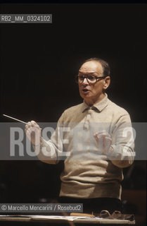 Rome, Pius XII Auditorium, 7-11-1998. Italian composer Ennio Morricone conducting a rehearsal / Roma, Auditorium Pio XII, 7-11-1998. Il compositore Ennio Morricone mentre dirige una prova - ©Marcello Mencarini/Rosebud2