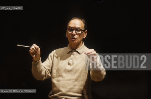 Rome, Pius XII Auditorium, 7-11-1998. Italian composer Ennio Morricone conducting a rehearsal / Roma, Auditorium Pio XII, 7-11-1998. Il compositore Ennio Morricone mentre dirige una prova - ©Marcello Mencarini/Rosebud2