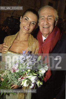 Spoleto Festival of Two Worlds, July 16, 2000. Founder of the Festival Gian Carlo Menotti and actress Chiara Muti, narrator voice in the closing show of the Festival (Joan of Arc at the Stake by Arthur Honeger), after her performance / Festival dei due Mondi di Spoleto, 16 luglio 2000. Il fondatore del Festival Gian Carlo Menotti e lattrice Chiara Muti, voce recitante nello spettacolo di chiusura del Festival (Giovanna DArco al rogo di Arthur Honeger), dopo la sua performance - ©Marcello Mencarini/Rosebud2