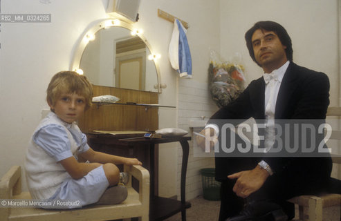 Florence, about 1980. Italian conductor Riccardo Muti in his dressing Room in the Teatro Comunale with his son Domenico / Firenze, 1980 circa. Il direttore dorchestra Riccardo Muti nel suo camerino nel Teatro Comunale con il figlio Domenico - ©Marcello Mencarini/Rosebud2