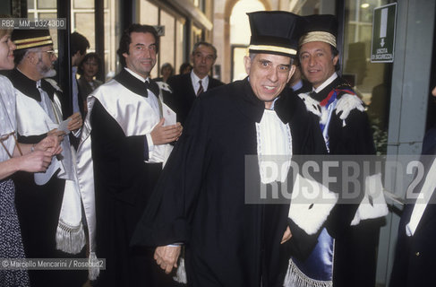 Bologna, 28-05-1991. Conductor Riccardo Muti (third from the right in the foreground) in the day of the honorary degree conferred to him by the University of Bologna, with music composer Aldo Clementi (second from the right in the foreground) and University chancellor Fabio Roversi Monaco (first from the right on the foreground) / Bologna, 28-05-1991. Il direttore dorchestra Riccardo Muti durante la cerimonia per la laurea honoris causa ricevuta dallUniversità di Bologna con il rettore Fabio Roversi Monaco e il compositore Aldo Clementi - ©Marcello Mencarini/Rosebud2