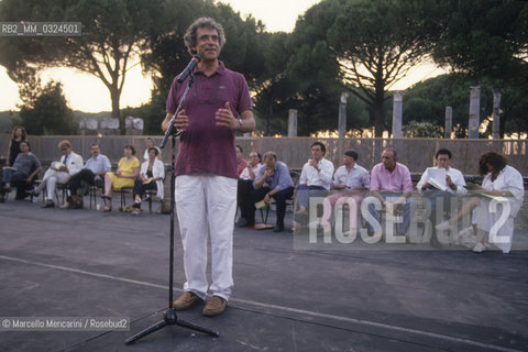 Italian politician Renato Nicolini speaking at Poets Festival,, in Ancient Ostia (Rome), 1994 / Il politico Renato Nicolini interviene al Festival dei poeti ad Ostia Antica, 1994 - ©Marcello Mencarini/Rosebud2