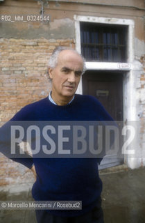 Venice, 1988. Italian composer Luigi Nono in front of his house / Venezia, 1988. Il compositore Luigi Nono di fronte alla sua casa - ©Marcello Mencarini/Rosebud2