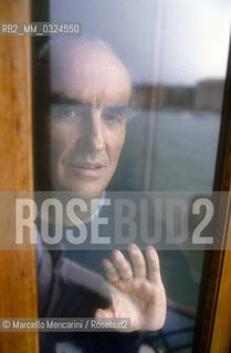 Venice, 1988. Italian composer Luigi Nono at a window of his house / Venezia, 1988. Il compositore Luigi Nono affacciato a una finestra della sua casa - ©Marcello Mencarini/Rosebud2