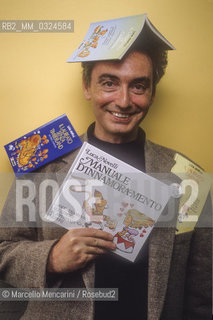 Lucca, 1984. Italian cartoonist Luca Novelli showing some of his comic books / Lucca, 1984. Il disegnatore di fumetti Luca Novelli mostra alcuni dei suoi libri - ©Marcello Mencarini/Rosebud2