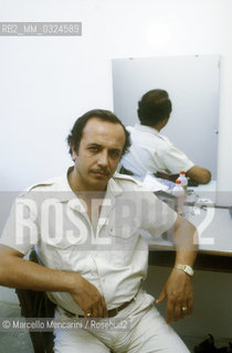 Pesaro, Rossini Opera Festival 1984. Italian opera singer baritone Leo Nucci in his dressing room before performing in Il viaggio a Reims (The Jorney to Reims) by Gioacchino Rossini / Pesaro, Rossini Opera Festival 1984. Il cantante lirico Leo Nucci nel suo camerino prima di cantare in Il viaggio a Reims di Gioacchino Rossini - ©Marcello Mencarini/Rosebud2