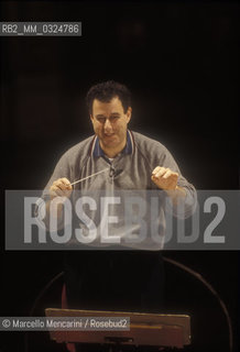 Rome, 1995. Israeli conductor Daniel Oren during a rehearsal / Roma, 1995 . Il direttore dorchestra Daniel Oren urante una prova - ©Marcello Mencarini/Rosebud2