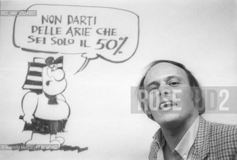 Lucca, 1986. Italian cartoonist Agostino Origone posing next to a character of his comic strip Nilus / Lucca, 1986. Il disegnatore di fumetti Agostino Origone mentre posa accanto a un personaggio della striscia Nilus - ©Marcello Mencarini/Rosebud2