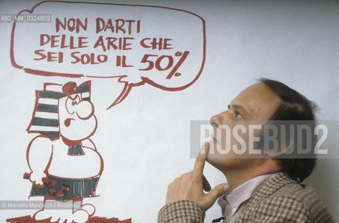 Lucca, 1986. Italian cartoonist Agostino Origone posing next to a character of his comic strip Nilus / Lucca, 1986. Il disegnatore di fumetti Agostino Origone mentre posa accanto a un personaggio della striscia Nilus - ©Marcello Mencarini/Rosebud2