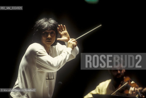 Florence, 1995. Japanese conductor Seiji Ozawa performing a rehearsal with Orchestra of the Florence May Festival / Firenze, 1995. Il direttore dorchestra Seiji Ozawa durante una prova con lorchestra del Maggio musicale fiorentino - ©Marcello Mencarini/Rosebud2