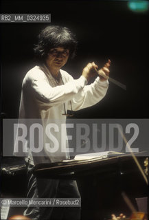 Florence, 1995. Japanese conductor Seiji Ozawa performing a rehearsal with Orchestra of the Florence May Festival / Firenze, 1995. Il direttore dorchestra Seiji Ozawa durante una prova con lorchestra del Maggio musicale fiorentino - ©Marcello Mencarini/Rosebud2