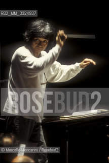 Florence, 1995. Japanese conductor Seiji Ozawa performing a rehearsal with Orchestra of the Florence May Festival / Firenze, 1995. Il direttore dorchestra Seiji Ozawa durante una prova con lorchestra del Maggio musicale fiorentino - ©Marcello Mencarini/Rosebud2