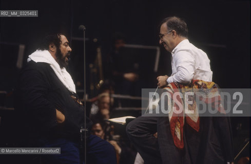 Venice, La Fenice Theater, 1993. Tenor Luciano Pavarotti and conductor Leone Magiera during a rehearsal / Venezia, Teatro La Fenice, 1993. Il tenore Luciano Pavarotti e in direttore dorchestra Leone Magiera durante una prova - ©Marcello Mencarini/Rosebud2