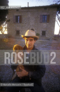 Montepulciano (Siena), 1986. Italian cartoonist Andrea Pazienza in front of his house / Montepulciano (Siena), 1986. Il fumettista Andrea Pazienza davanti alla sua casa - ©Marcello Mencarini/Rosebud2