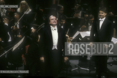 Italian bass-baritone opera singer Ruggero Raimondi greeting the audience during a recital (about 1985) / Il basso-baritono Ruggero Raimondi saluta il pubblico durante un recital (1985 circa) - ©Marcello Mencarini/Rosebud2