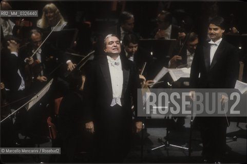 Italian bass-baritone opera singer Ruggero Raimondi greeting the audience during a recital (about 1985) / Il basso-baritono Ruggero Raimondi saluta il pubblico durante un recital (1985 circa) - ©Marcello Mencarini/Rosebud2