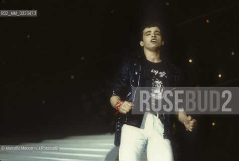 Sanremo Music Festival 1984. Italian pop singer Eros Ramazzotti performing Terra Promessa, winning song in the New Proposals category / Festival di Sanremo 1984. Eros Ramazzotti canta Terra promessa, canzone vincitrice della categoria Nuove proposte - ©Marcello Mencarini/Rosebud2