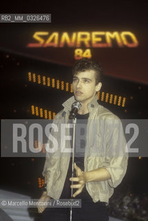 Sanremo Music Festival 1984. Italian pop singer Eros Ramazzotti performing Terra Promessa, winning song in the New Proposals category / Festival di Sanremo 1984. Eros Ramazzotti canta Terra promessa, canzone vincitrice della categoria Nuove proposte - ©Marcello Mencarini/Rosebud2