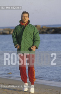 Sanremo Music Festival 1986. Italian pop singer Eros Ramazzotti, winner of the Festival with the song Adesso tu, training at the beach / Festival di Sanremo 1986. Eros Ramazzotti, vincitore con la canzone Adesso tu, si allena in spiaggia - ©Marcello Mencarini/Rosebud2