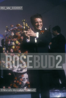 Sanremo Music Festival 1988. Italian pop singer Massimo Ranieri, winner of the Festival with the song Perdere lAmore / Festival di Sanremo 1988. Massimo Ranieri, vincitore del Festival con la canzone Perdere lamore - ©Marcello Mencarini/Rosebud2