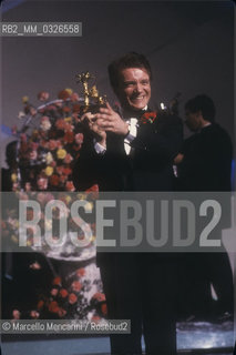 Sanremo Music Festival 1988. Italian pop singer Massimo Ranieri, winner of the Festival with the song Perdere lAmore / Festival di Sanremo 1988. Massimo Ranieri, vincitore del Festival con la canzone Perdere lamore - ©Marcello Mencarini/Rosebud2