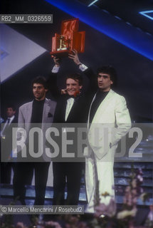 Sanremo Music Festival 1988. Italian pop singers Luca Barbarossa, Massimo Ranieri and Toto Cutugno, respectively the third, first and second place / Festival di Sanremo 1988. Luca Barbarossa, Massimo Ranieri e Toto Cutugno, rispettivamente terzo, primo e secondo classificato - ©Marcello Mencarini/Rosebud2