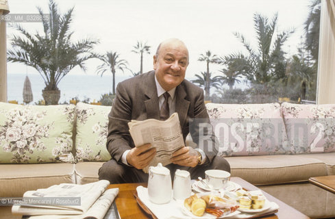 Sanremo Music Festival 1984. Gianni Ravera, music organizer of the Festival, in the Royal Hotel hall / Festival di Sanremo 1984. Lorganizzatore musicale Gianni Ravera nella hall dellHotel Royal - ©Marcello Mencarini/Rosebud2