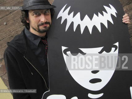 Milan May 3, 2011. American cartoonist Rob Reger posing next to a cutout of his character Emily the Strange / Milano, May 3, 2011. il disegnatore Rob Reger posa accanto alla sagoma del suo personaggio Emily the Strange - ©Marcello Mencarini/Rosebud2