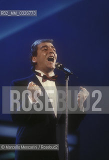 Sanremo Music Festival 1988. Italian pop singer Mino Reitano performing his song Italia, ranked sixth / Festival di Sanremo 1988. IMino Reitano canta Italia, canzone sesta classificata - ©Marcello Mencarini/Rosebud2