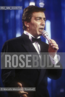 Sanremo Music Festival 1988. Italian pop singer Mino Reitano performing his song Italia, ranked sixth / Festival di Sanremo 1988. IMino Reitano canta Italia, canzone sesta classificata - ©Marcello Mencarini/Rosebud2