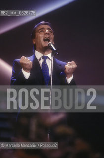 Sanremo Music Festival 1988. Italian pop singer Mino Reitano performing his song Italia, ranked sixth / Festival di Sanremo 1988. IMino Reitano canta Italia, canzone sesta classificata - ©Marcello Mencarini/Rosebud2