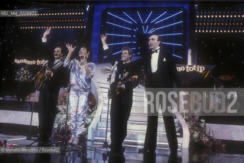 Sanremo Music Festival 1985. The Italian pop group I Ricchi e Poveri, winners with the song Se minnamoro, and Festival TV presenter Pippo Baudo / Festival di Sanremo 1985. I Ricchi e Poveri, vincitori del Festival con la canzone Se minnamoro, e il presentatore televisivo Pippo Baudo - ©Marcello Mencarini/Rosebud2