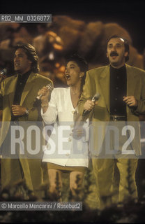 Sanremo Music Festival 1990. Italian pop group I Ricchi e Poveri performing their song Buona Giornata / Festival di Sanremo 1990. I Ricchi e Poveri cantano Buona giornata - ©Marcello Mencarini/Rosebud2