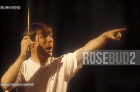 Venice, 1995. American conductor David Robertson performing a rehearsal / Venezia, 1995. Il direttore dorchestra David Robertson durante una prova - ©Marcello Mencarini/Rosebud2