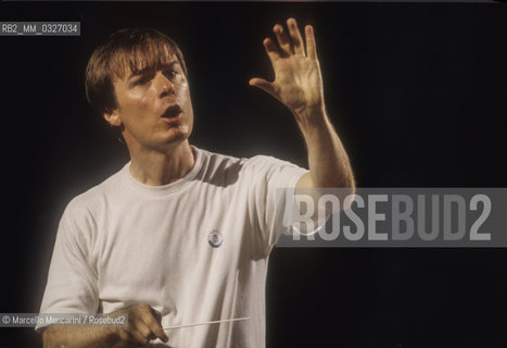 Venice, 1995. American conductor David Robertson performing a rehearsal / Venezia, 1995. Il direttore dorchestra David Robertson durante una prova - ©Marcello Mencarini/Rosebud2