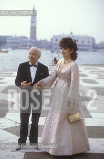 Venice, San Giorgio Island, about 1985. Italian publisher Edilio Rusconi and actress Gina Lollobrigida / Venezia, Isola di San Giorgio, 1985 circa. Leditore Edilio Rusconi con Lattrice Gina Lollobrigida - ©Marcello Mencarini/Rosebud2