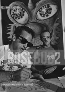 Milan, 1985. American artists Kenny Scharf and Keith Haring during a press conference after a performance at the Fiorucci store / Milano, 1985. Gli artisti Kenny Scharf e Keith Haring durante una conferenza stampa dopo una performance nel negozio Fiorucci - ©Marcello Mencarini/Rosebud2