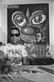 Milan, 1985. American artists Kenny Scharf and Keith Haring during a press conference after a performance at the Fiorucci store / Milano, 1985. Gli artisti Kenny Scharf e Keith Haring durante una conferenza stampa dopo una performance nel negozio Fiorucci - ©Marcello Mencarini/Rosebud2